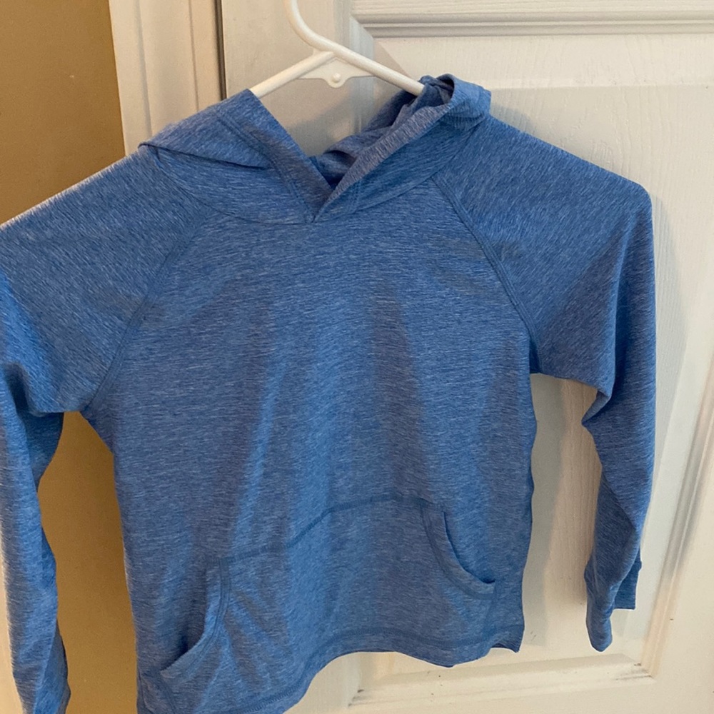 Hanna Andersson light weight UV protected shirt. Front pocket and thumb holes.